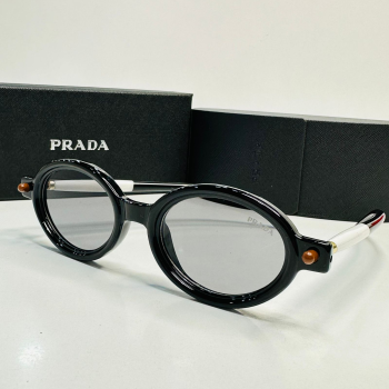 Sunglasses - Prada 9337