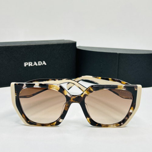 Sunglasses - Prada 9052