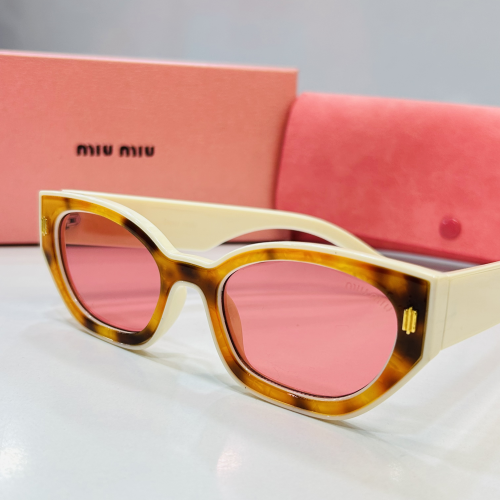 Sunglasses - Miu Miu 9999
